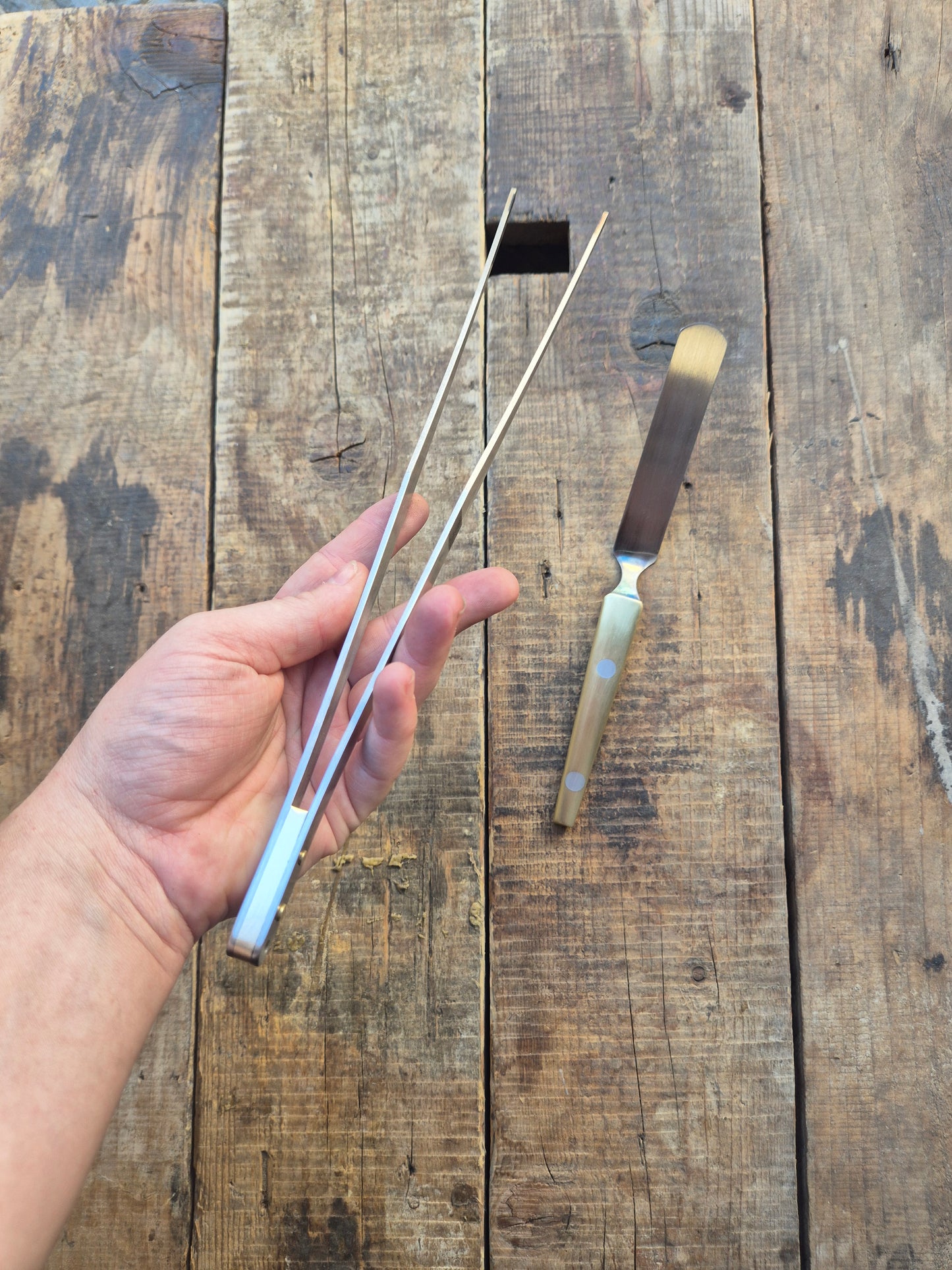 Pinza e spatola di Ottone